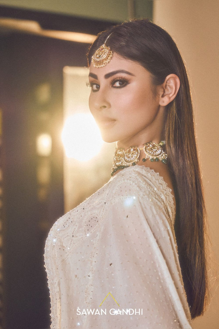 Mouni Roy in Ivory sequins lehenga set