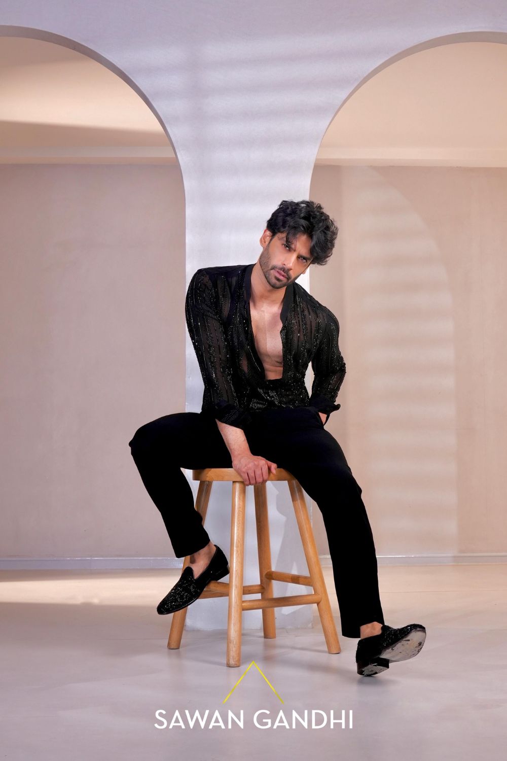 Gaurav in Black swarovski line shirt