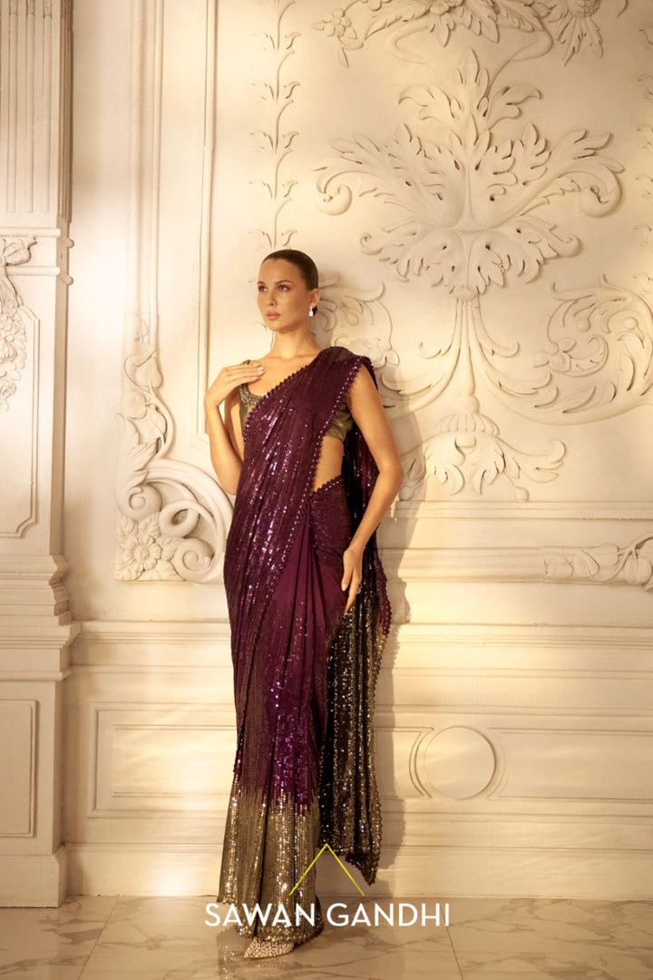 Madhuri Dixit in Wine to grey sequin saree