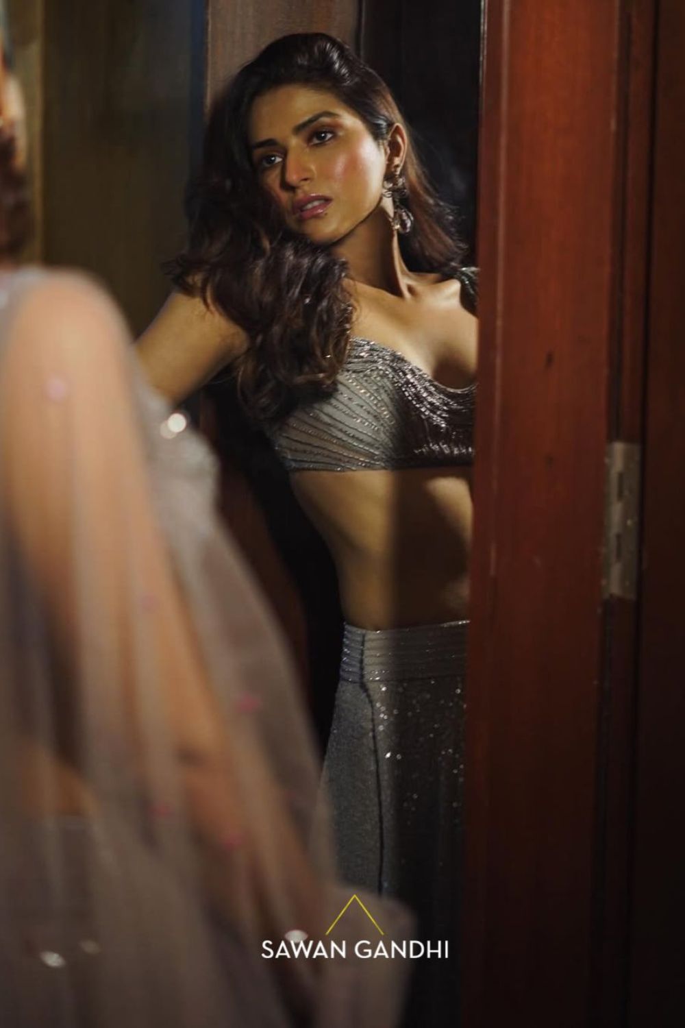 Pranutan Bahl in Grey to pink ombre sequins lehenga