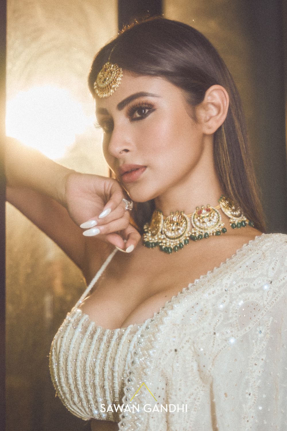 Mouni Roy in Ivory sequins lehenga set