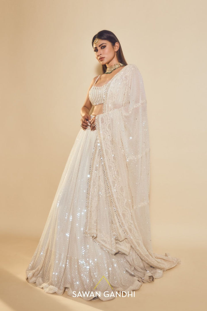 Mouni Roy in Ivory sequins lehenga set
