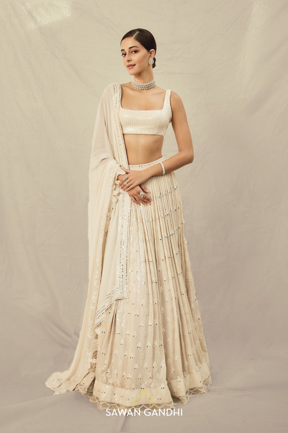 Ananya panday in Beige paani sequins mirror booti lehenga