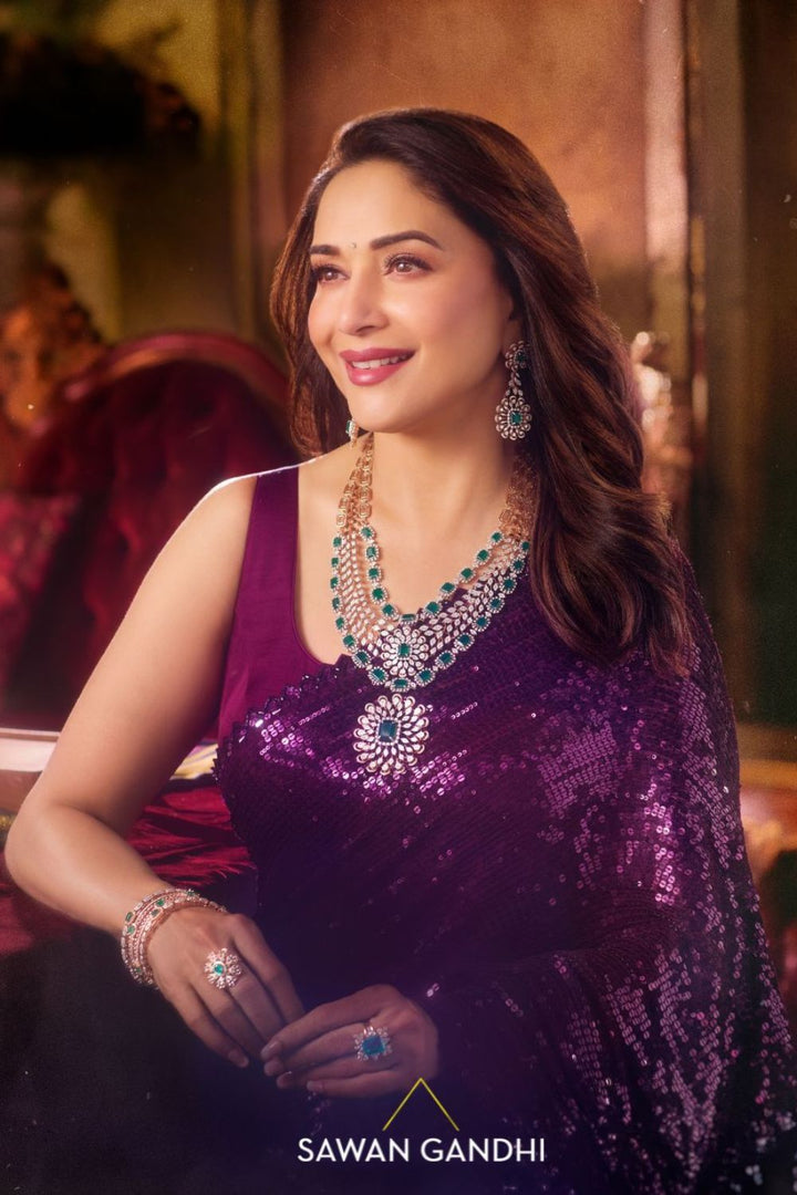 Madhuri Dixit in Wine to grey sequin saree