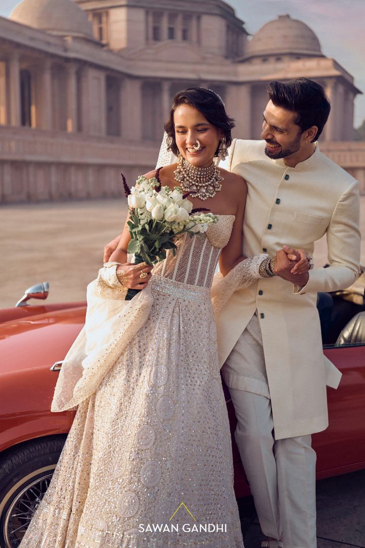 IVORY SHERWANI WITH EMERALD ACCENTS