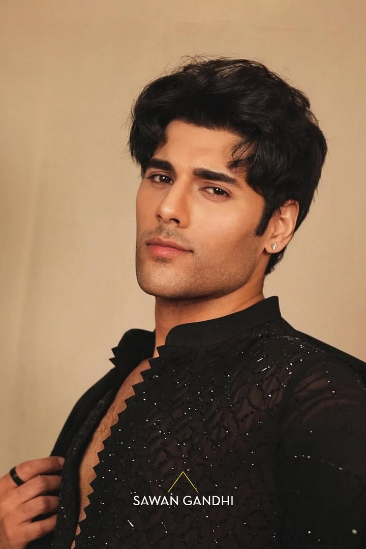 Tushar Khanna in Black swarosvki jaal kurta with stole