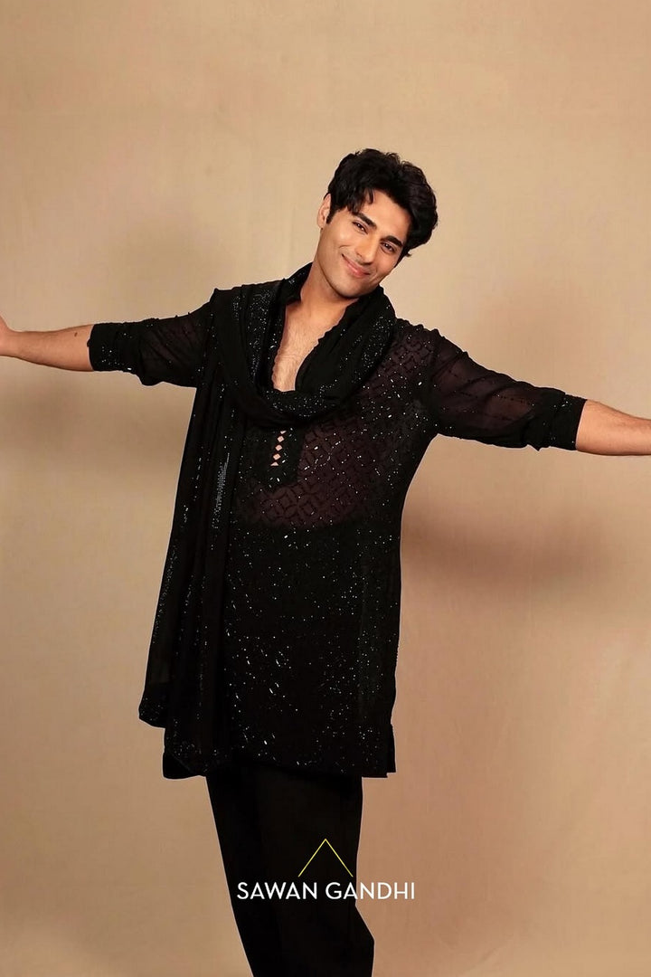 Tushar Khanna in Black swarosvki jaal kurta with stole