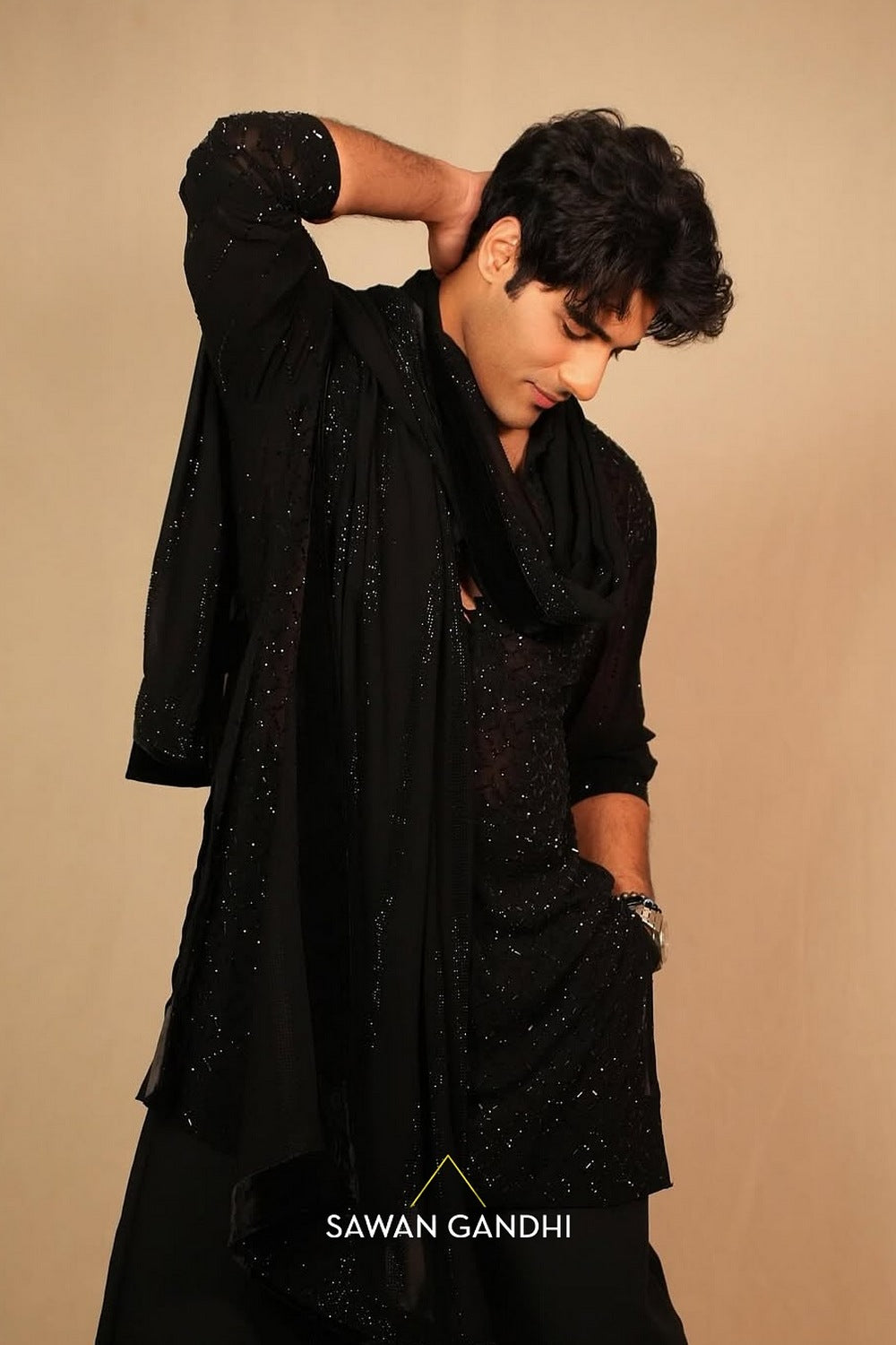 Tushar Khanna in Black swarosvki jaal kurta with stole