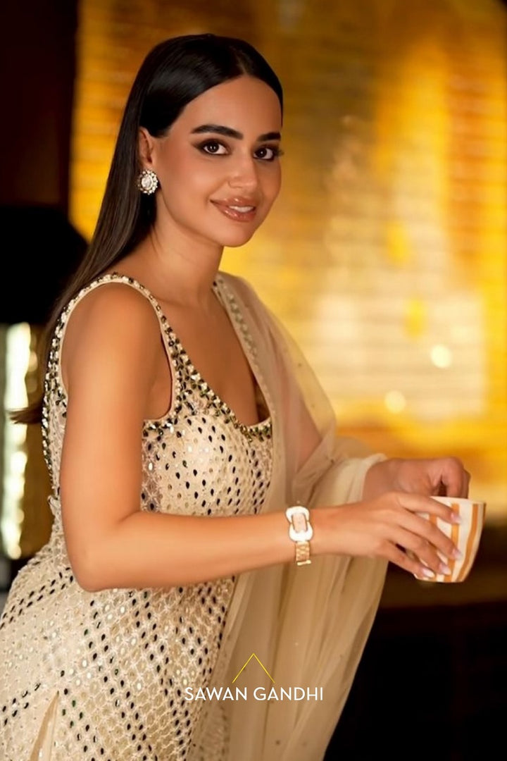 Arushi Mehra in Ivory Pearl Tassel Suit