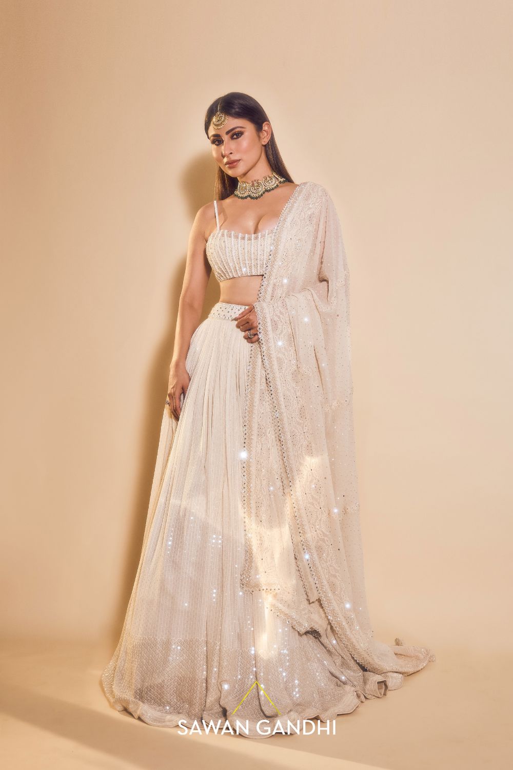 Mouni Roy in Ivory sequins lehenga set