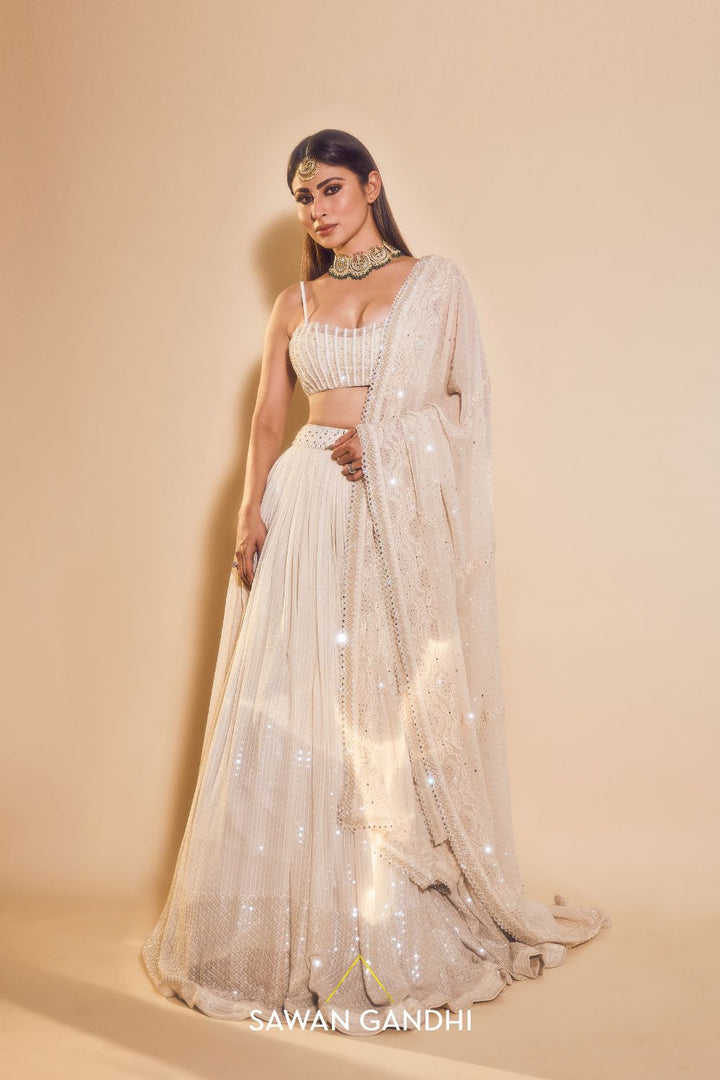 Mouni Roy in Ivory sequins lehenga set