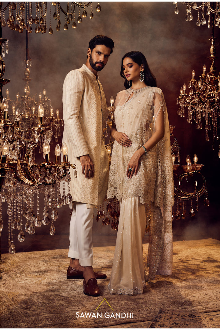 Ivory sequins chikankari saree with coral cape