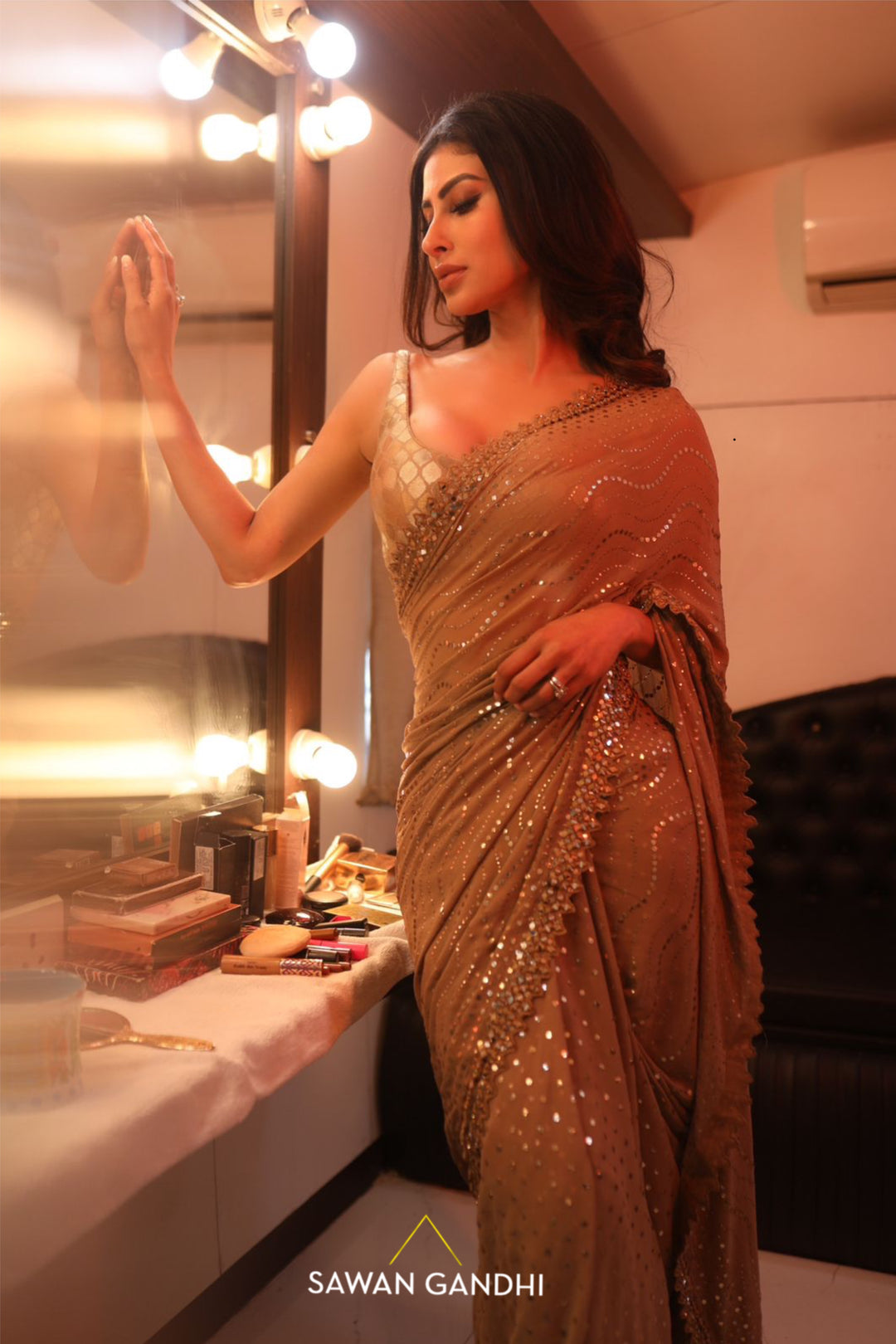 Mouni Roy in Golden mukaish saree