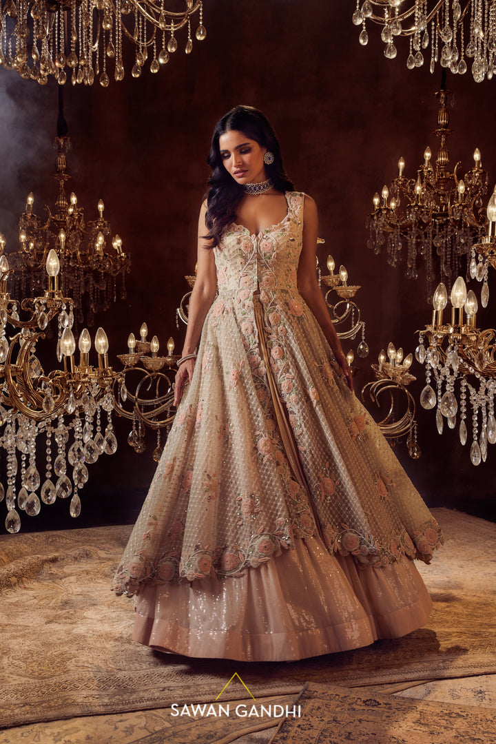 Ivory pink appliqué cape and lehenga set
