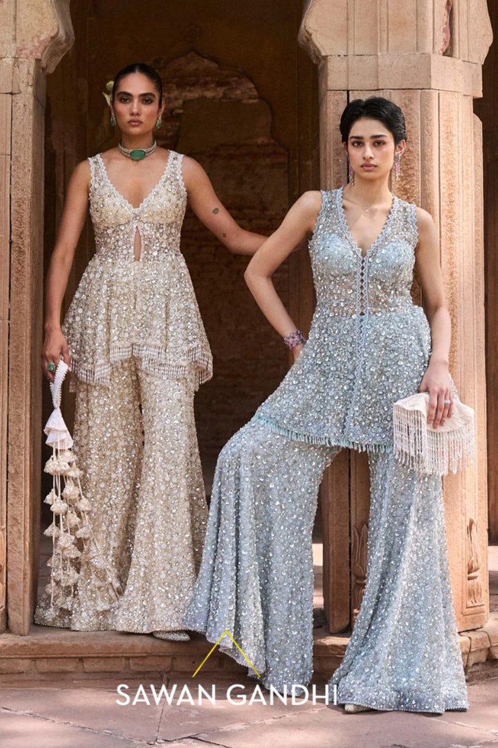 Ivory Cutdana And Sequins Peplum Set