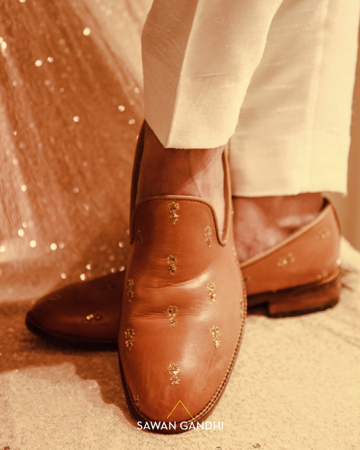 Light tan flower booti shoes