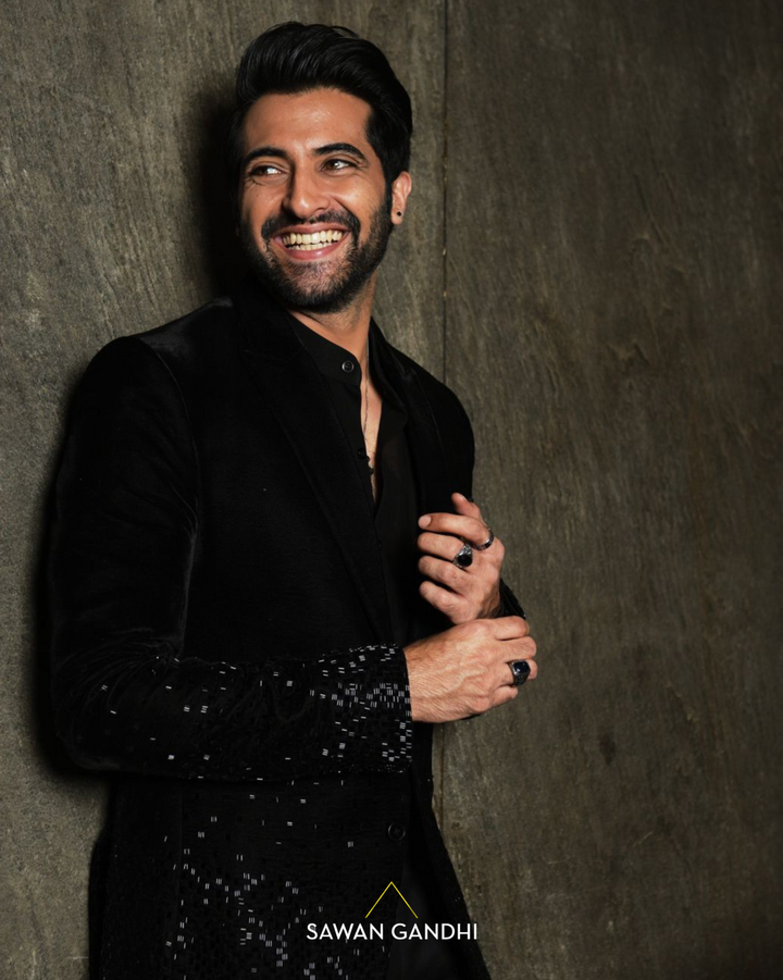 Akshay Oberoi in Noir cutdana scattered down jacket