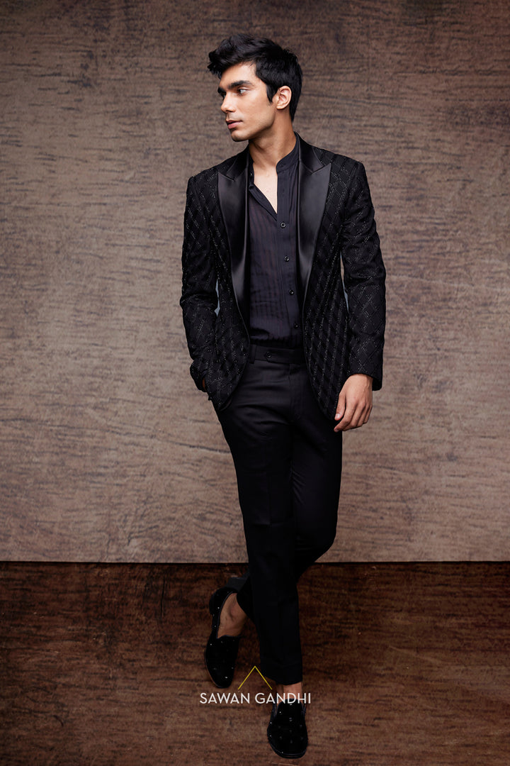 Black tuxedo with thread and cutdana work