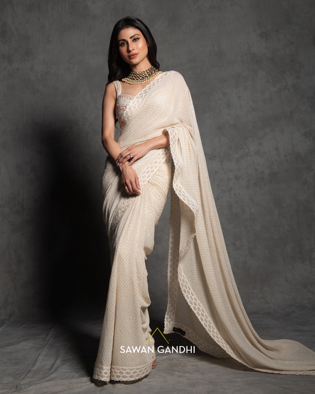 Mouni Roy in Ivory mukaish work saree