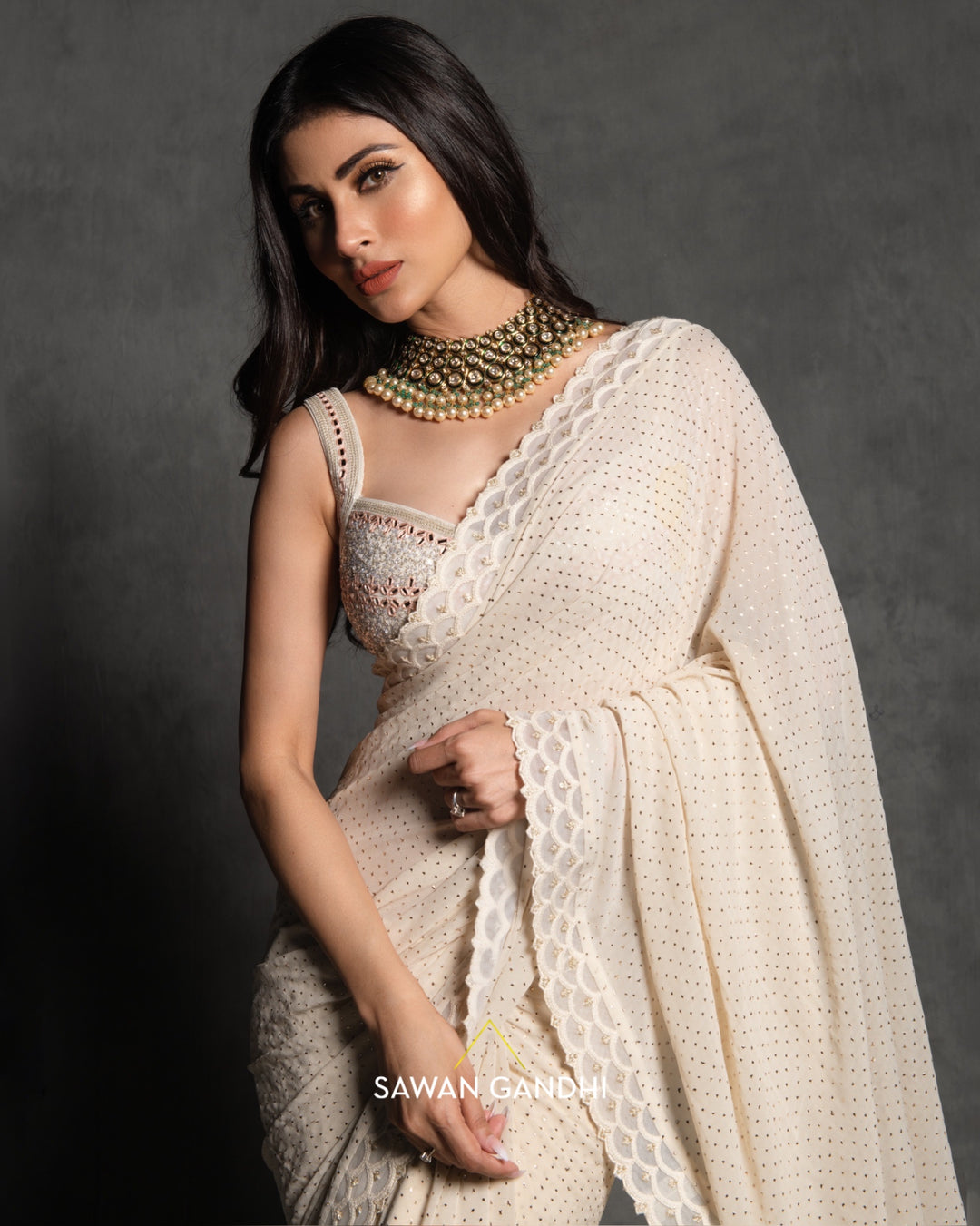 Mouni Roy in Ivory mukaish work saree