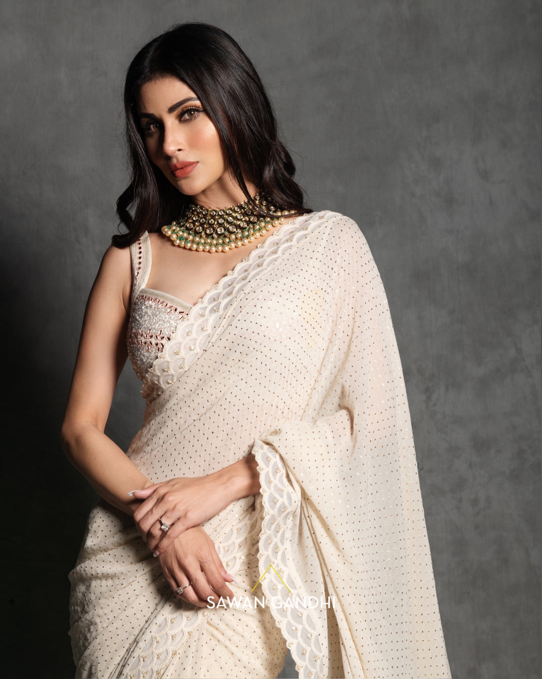 Mouni Roy in Ivory mukaish work saree