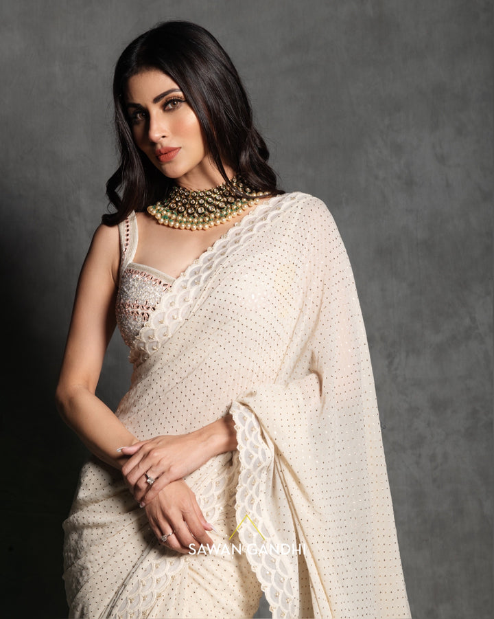 Mouni Roy in Ivory mukaish work saree