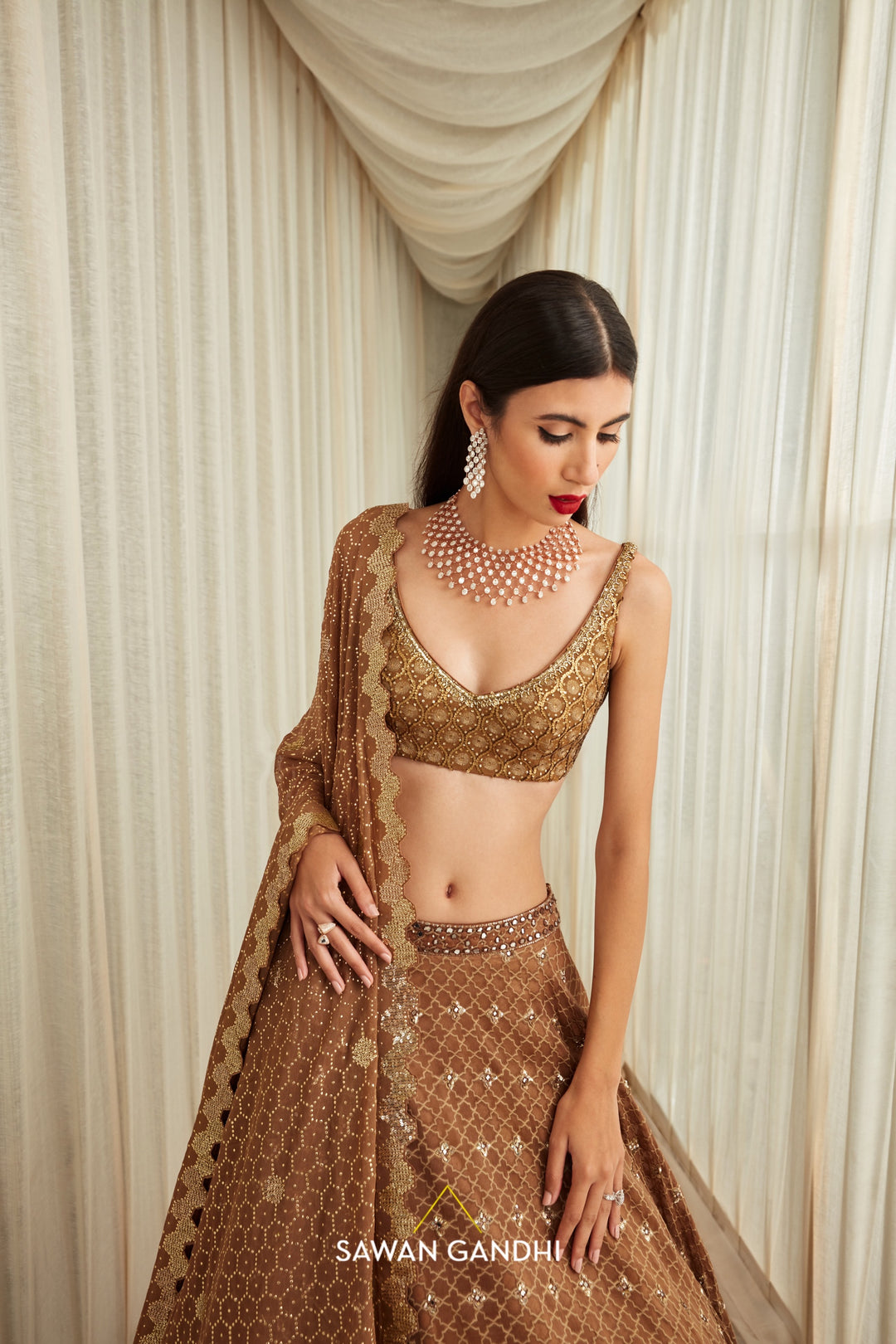 Oxidised gold rombus pattern sequins and mirror work lehenga set