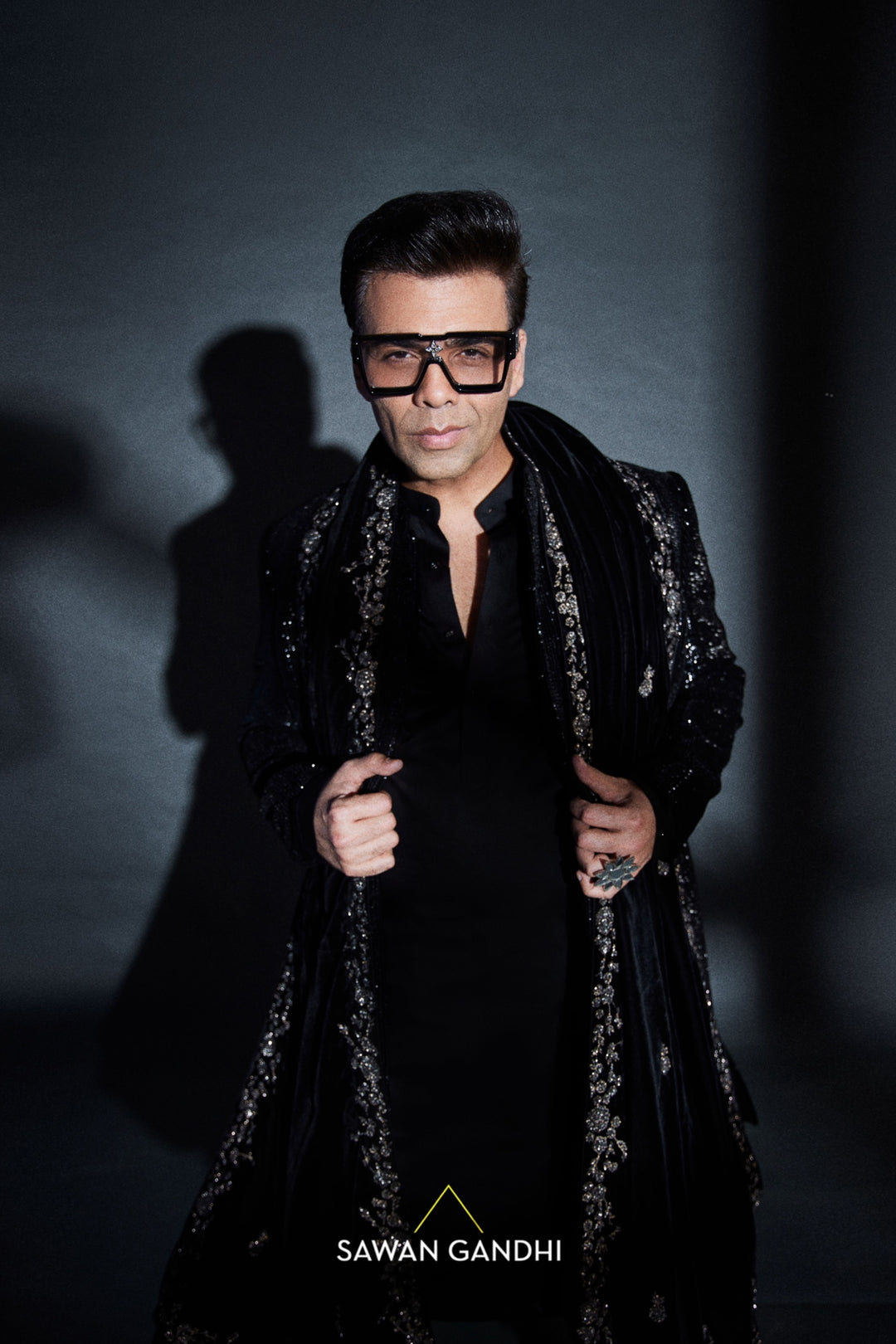Karan Johar in Black sequins sherwani with stole