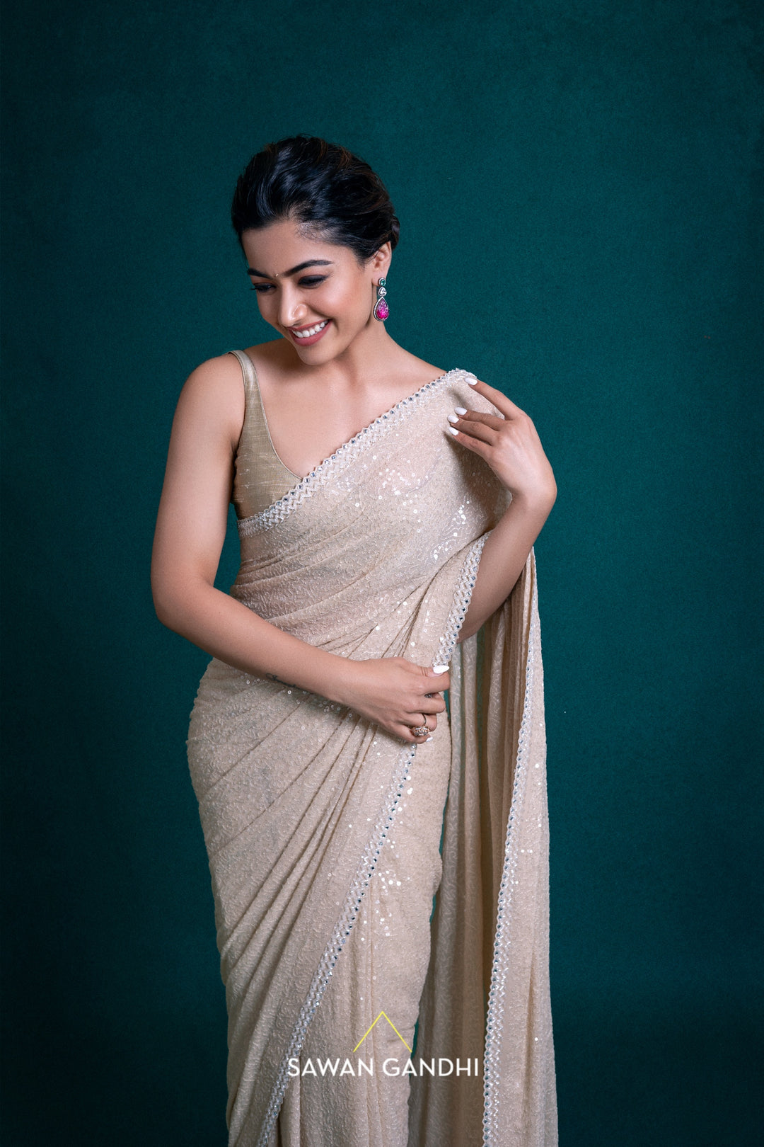 Rashmika Mandanna in Beige Sequins Saree