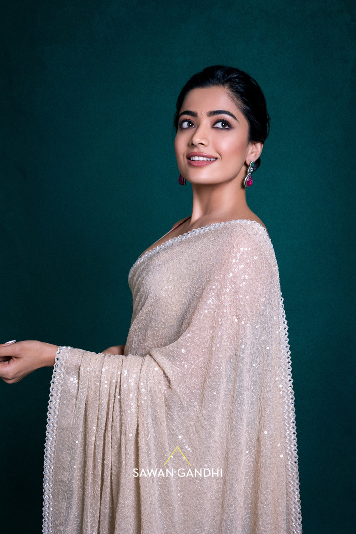 Rashmika Mandanna in Beige Sequins Saree
