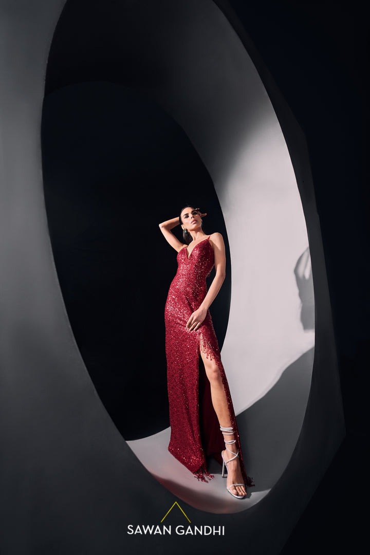Red sequins slit gown